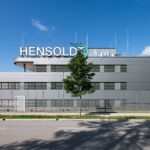 HENSOLDT ranked first in sustainability rating HENSOLDT Zentrale Taufkirchen red